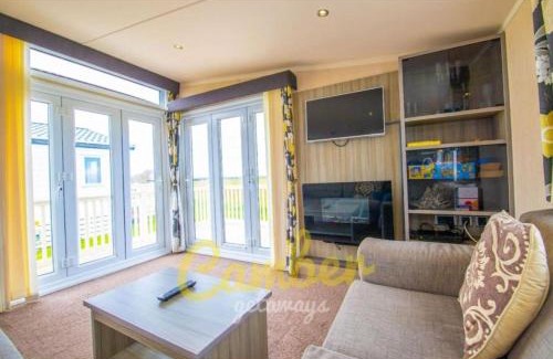 Camber Resort | MP502 - Camber Sands Holiday Park - Sleeps 6 - Small Dog - Gated Decking - Amazing Marsh Views