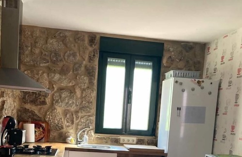 Nigran House | Muiño. Small house near America beach