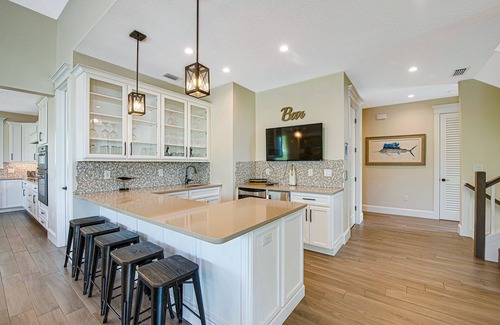Bradenton Beach House | Multi family beach house! 9 bedrooms, pool with waterslide + rooftop deck