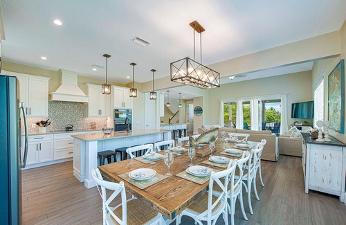 Bradenton Beach House | Multi family beach house! 9 bedrooms, pool with waterslide + rooftop deck