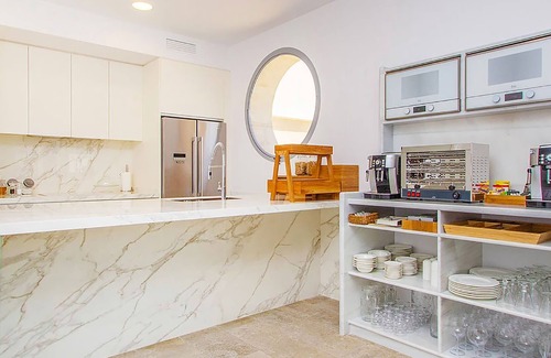 Establiments Villa | My Rental Homes | Villa The World with salted pool, garden and a gym room