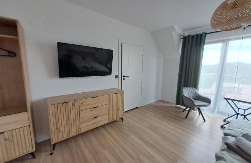 Ryn Resort | Nad Zatoką pokoje z widokiem na jezioro