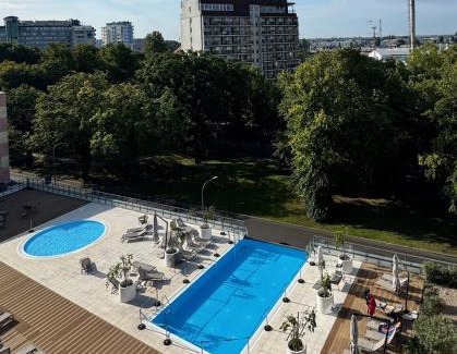 Dzielnica Uzdrowiskowa Apartment | Nadmorskie Tarasy Apartament SORRENTO z garażem,basen, sauna,jacuzzi
