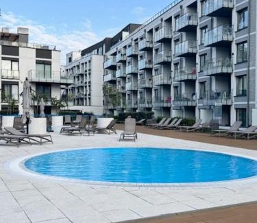 Dzielnica Uzdrowiskowa Apartment | Nadmorskie Tarasy Apartament SORRENTO z garażem,basen, sauna,jacuzzi