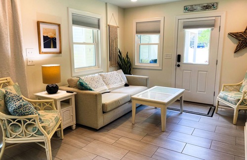 Kitty Hawk House | Nestled in live oaks trees, 3 min walk to sound, contemporary beachside cottage