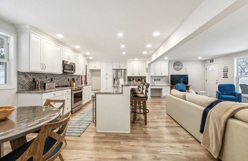 Rapid City House | NEW! Beautiful Torch Lake House with Beach Access