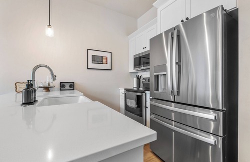 Egg Harbor Condo | New Construction: Hot tub and Gym near Downtown Egg Harbor