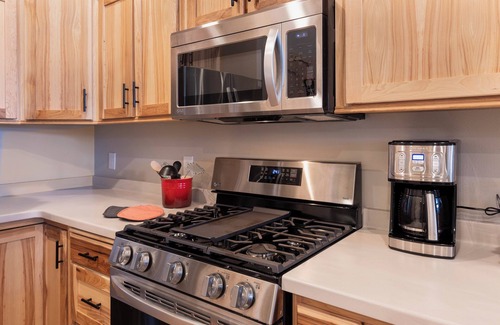 Eagle River House | NEW Construction Lake House with Paddle Boards, Kayaks, Shuffleboard & More!