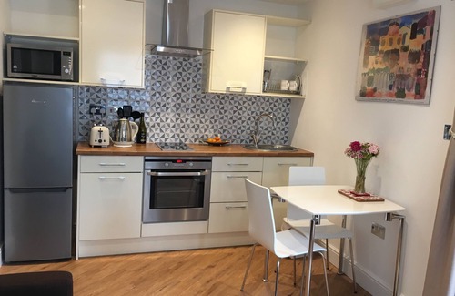 Barton-on-Sea Apartment | New Forest Barton-on-Sea cliff top, ground floor, garden apartment. 'Bayside'.