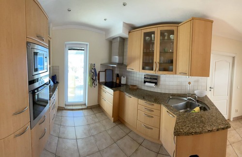 Steindorf am Ossiacher See Condo | NEW from 23! two-storey holiday apartment with a fantastic lake view terrace and garden