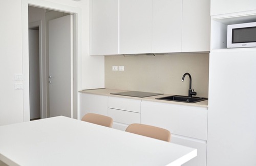 Faro Apartment | NEW in Jesolo with swimming pool, near the sea. Apartment 1