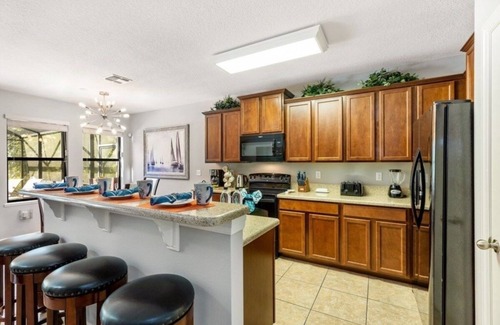 Cypress Pointe Villa | NEW! Luxury 4BR Retreat w/Pool, Game Room & Close to Disney Attractions