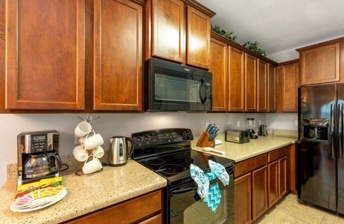 Cypress Pointe Villa | NEW! Luxury 4BR Retreat w/Pool, Game Room & Close to Disney Attractions