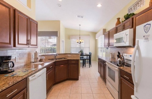 Windsor Palms Villa | NEW! Modern Villa w/South-Facing Pool, Spa & Game Room Near Disney