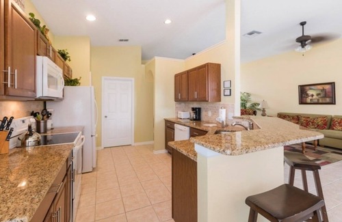 Windsor Palms Villa | NEW! Modern Villa w/South-Facing Pool, Spa & Game Room Near Disney