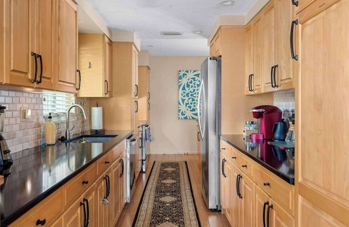 Palma Sola House | NEW! Sunshine Getaway! Heated Pool, Hot Tub, Games Villa