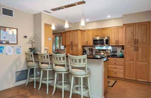 Palma Sola House | NEW! Sunshine Getaway! Heated Pool, Hot Tub, Games Villa