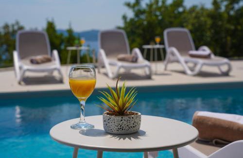 Lozica Villa | New, villa Bond Dubrovnik, beautiful sea view near beach with heated pool