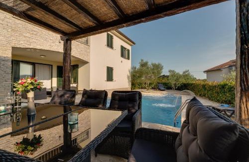 Brzac Villa | New villa with swimming pool, olive grove and sea view by Traveler tourist agency Krk ID 2201