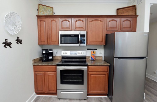 Panama City Beach Condo | Newly Renovated Beach Front Condo with BEACH CHAIR SERVICE, High Speed Wifi