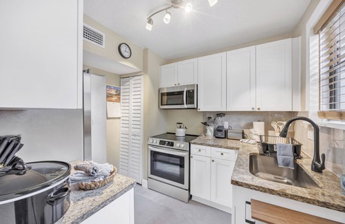 San Marco House | newly renovated chic house with covered patio & yard steps from San Marco Square