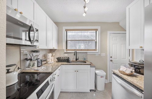 San Marco House | newly renovated chic house with covered patio & yard steps from San Marco Square