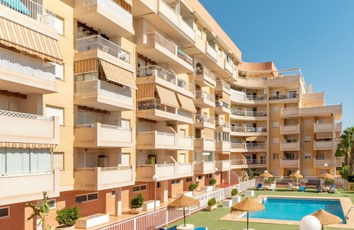 Roquetas de Mar Apartment | Nice apartment for 4 people with A/C, pool, WIFI, TV, terrace and pets allowed