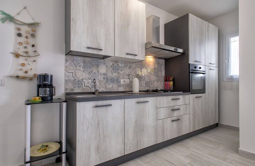 La Muddizza Apartment | Nice apartment for 6 people with WIFI, pool, A/C, TV, patio, pets allowed and parking