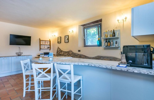 Castagneto Carducci Villa | Nice apartment in villa for 4 guests with WIFI, A/C, pool, TV and pets allowed