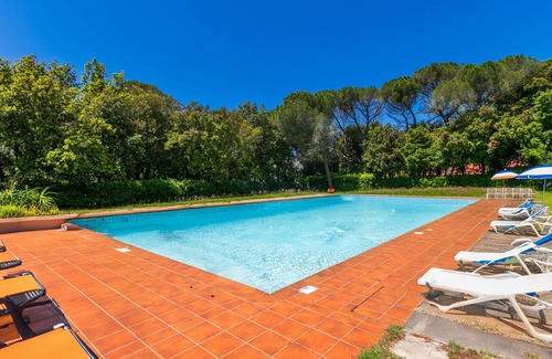 Rosignano Marittimo Apartment | Nice apartment for 4 guests with WIFI, pool, TV and patio