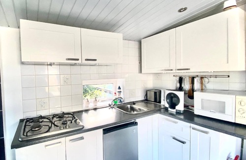 Onderdijk House | Nice holiday home "Isabella" with a view of the water