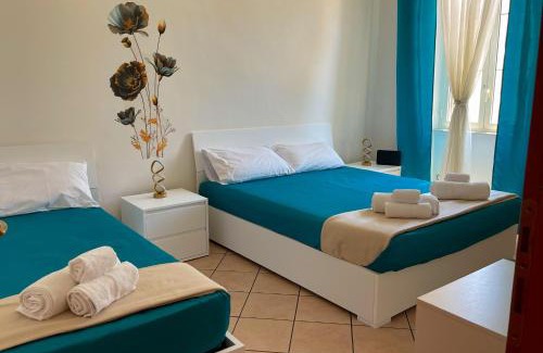 Nettuno Apartment | NIMPHAEA BLUE APARTMENT - Elegant Central Flat, Walk to Beach & Train Station