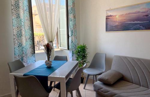 Nettuno Apartment | NIMPHAEA BLUE APARTMENT - Elegant Central Flat, Walk to Beach & Train Station