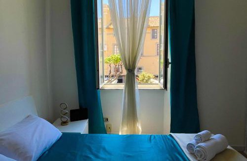 Nettuno Apartment | NIMPHAEA BLUE APARTMENT - Elegant Central Flat, Walk to Beach & Train Station