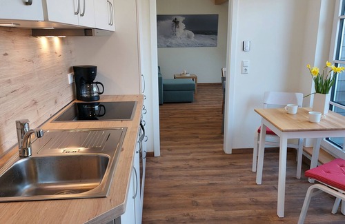 Bastorf Apartment | No.1/2-room apartment (right, 60m²) 2-4 pers., loggia, upper floor + ground floor - H3 Wohnen am Hofcafé