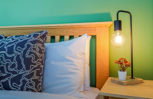 Canton House | Noah Suite - Central 2BR Apartment with Parking & WIFI