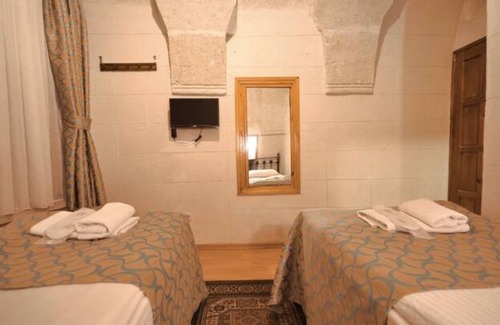 Goreme House | Nomads - Traditional Arch Stone room at the center