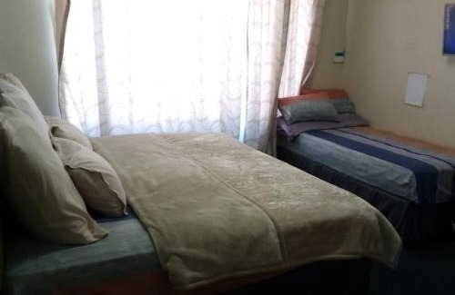 New Redruth House | Nsk Guest House Alberton