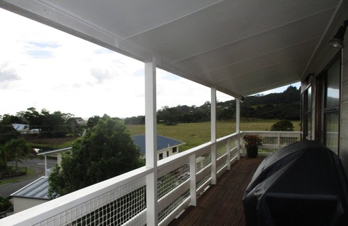 Oakura House | Oakura Lookout is a comfy bach overlooking Oakura with some water views.