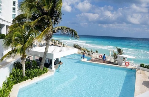 Zona Hotelera Condo | Ocean and Lagoon stunning views, balcony, spa, gym, beach, pool