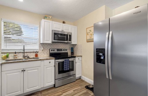 Tropic Cottage | Ocean Themed Cottage With A Heated Pool Close to The Beach, Cruises, and Disney!