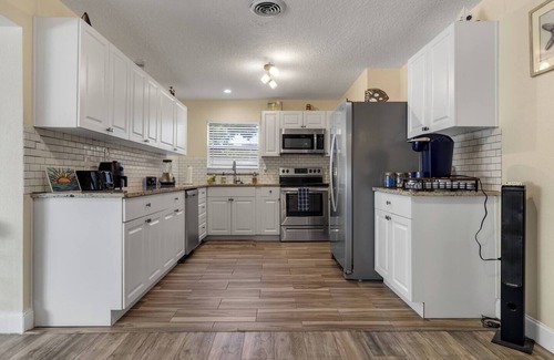 Tropic Cottage | Ocean Themed Cottage With A Heated Pool Close to The Beach, Cruises, and Disney!