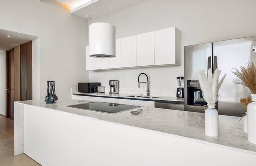 Flamingos Condo | Ocean-view 5th-floor condo with 4 pools, sauna, steam room, huge balcony, & gym