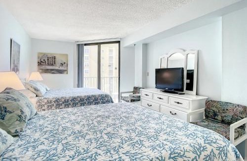 New Smyrna Beach Apartment | Ocean View with a beachfront pool at Ocean Trillium Condo ~ 402