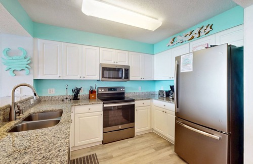 Ocean Drive Condo | Oceanfront condo with pool, hot tub, private balcony & close to golf