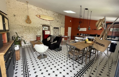 Royan House | Old restored wine storehouse between sea and forest