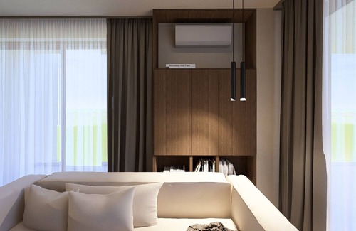 Basanija Apartment | Olea Residences - A4 - One-Bedroom Retreat with Sunlit Balcony & Garden Views