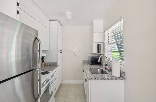 Bay Esplanade Villa | One Bedroom Villa with full kitchen On Clearwater Beach steps from the water.