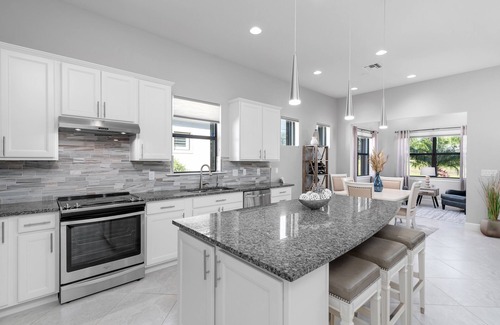 Arborwood House | Open concept, water view in desirable Plantation Somerset Gateway Fort Myers, FL