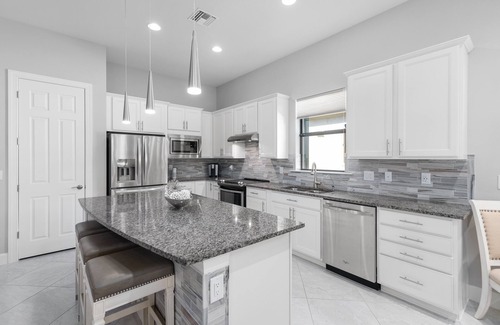 Arborwood House | Open concept, water view in desirable Plantation Somerset Gateway Fort Myers, FL